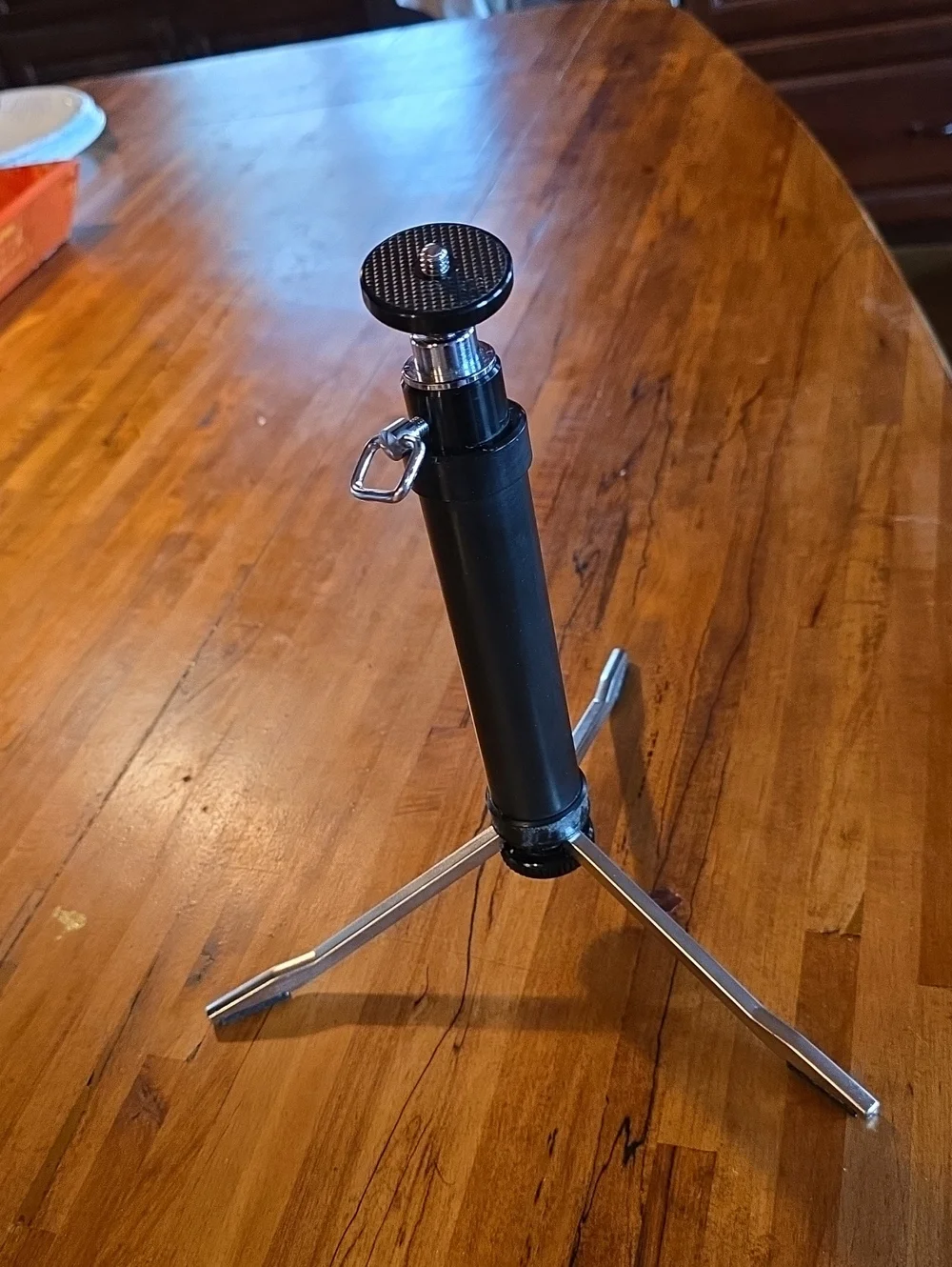 2 Lightweight Tripods-1 is a mini ( 2nd pic) portable & adjustable w carry case.